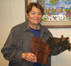 Photo of Andria Blattner accepting her award