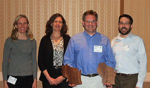 Andrew Struck, Ozaukee County Planning and Parks Dept. 
				Director accepting the awards